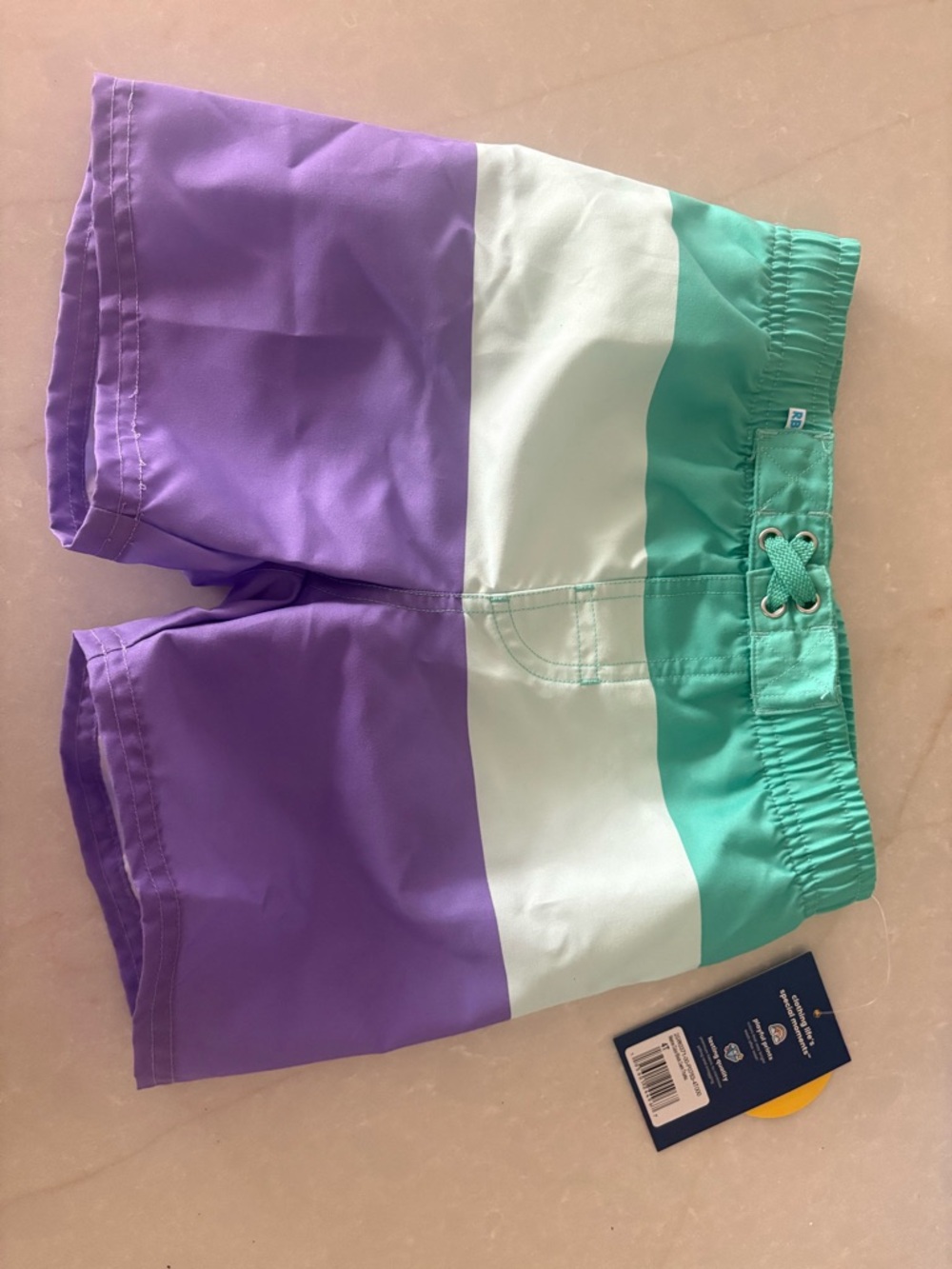 RuffleButt Kids Colorblock Swim Trunks | 4T